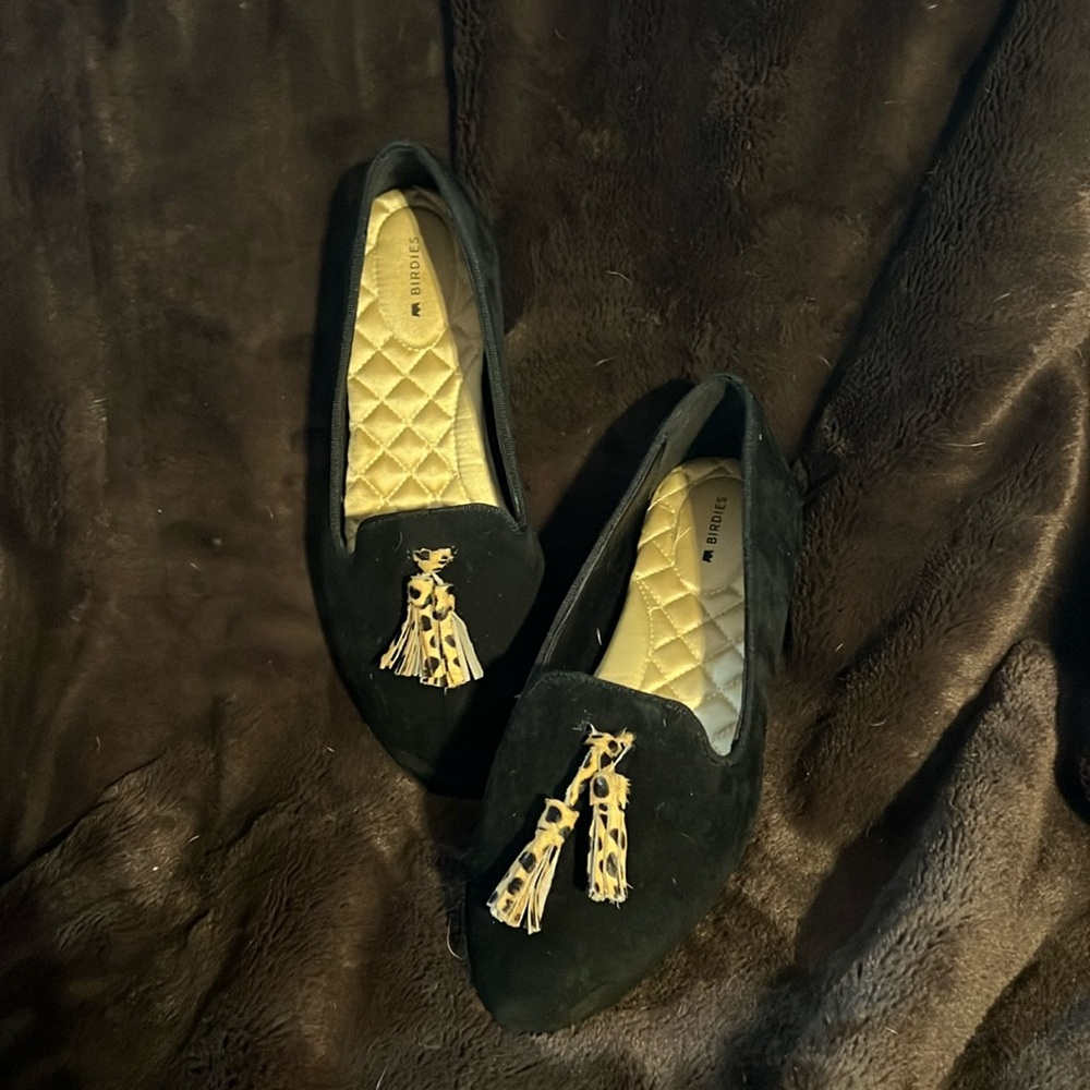 Black suede with leopard tassel flats.